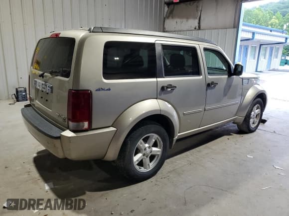 ✅ 2010 Dodge Nitro SXT • VIN: 1D4PU5GK1AW124187 • Lot: 64784875. Listed on Copart with 103,950 mi. Free auction sales archive from the USA and detailed vehicle history report at DreamBid. Image 3.