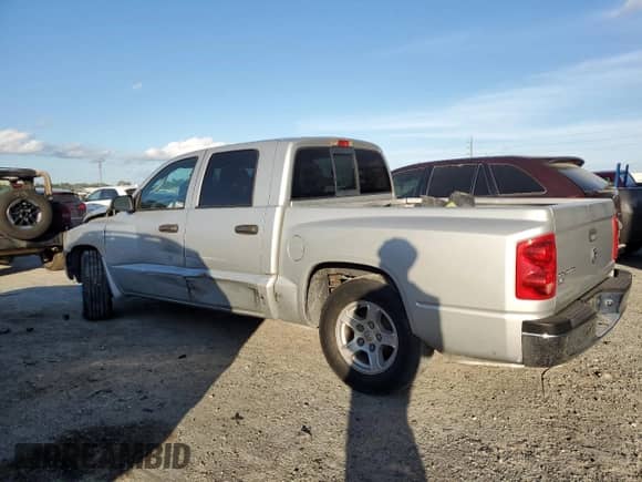 2005 Dodge Dakota SLT с VIN 1D7HE48K75S207617, выставлен на аукционе Copart как лот 81713524 с пробегом Не указан миль и Списание • Salvage title. История ставок и продаж доступна на DreamBid. Изображение 2.