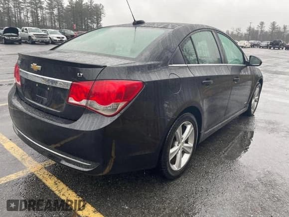 ✅ 2015 Chevrolet Cruze LT • VIN: 1G1PE5SB0F7126024 • Lot: 70772502. Listed on Copart with 96,119 mi. Free auction sales archive from the USA and detailed vehicle history report at DreamBid. Image 4.
