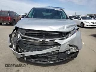 ✅ 2020 Chevrolet Traverse Premier • VIN: 1GNEVKKW2LJ158561 • Lot: 82009605. Wystawiony na Copart z przebiegiem 34 248 mil. Bezpłatny archiwum sprzedaży aukcyjnych z USA i szczegółowy raport historii pojazdu na DreamBid. Zdjęcie 5.