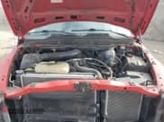 ✅ 2002 Dodge 1500 • VIN: 3D7HU18Z82G149681 • Лот: 82276575. Опубликован ранее на Copart с пробегом 208 131 миль. Бесплатный доступ к архиву аукционных продаж из США и подробный отчёт об истории автомобиля на DreamBid. Изображение 11.