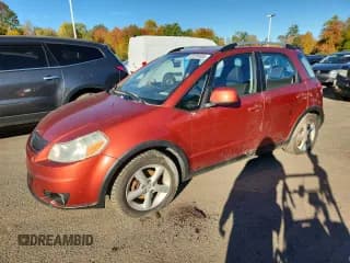 ✅ 2009 Suzuki SX4 Touring AWD • VIN: JS2YB417795101512 • Lot: 87224405. Wystawiony na Copart z przebiegiem 144 763 mil. Bezpłatny archiwum sprzedaży aukcyjnych z USA i szczegółowy raport historii pojazdu na DreamBid. Zdjęcie 1.