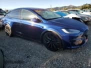 ✅ 2023 Tesla Model X • VIN: 7SAXCAE55PF415717 • Lot: 85123705. Wystawiony na Copart z przebiegiem 26 363 mil. Bezpłatny archiwum sprzedaży aukcyjnych z USA i szczegółowy raport historii pojazdu na DreamBid. Zdjęcie 4.