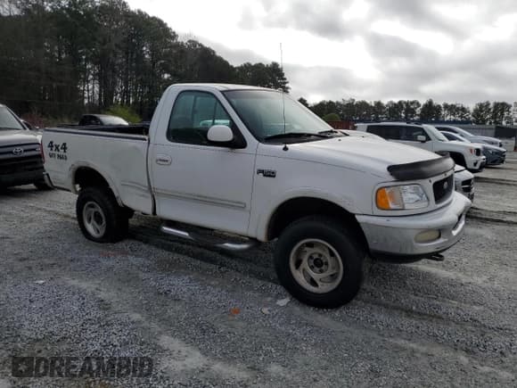 ✅ 1997 Ford F-150 • VIN: 1FTEF18L9VLA67971 • Lot: 49060875. Listed on Copart with 362,843 mi. Free auction sales archive from the USA and detailed vehicle history report at DreamBid. Image 4.