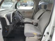 ✅ 2009 Nissan Cube S • VIN: JN8AZ28R89T130486 • Lot: 87273395. Listed on Copart with 180,681 mi. Free auction sales archive from the USA and detailed vehicle history report at DreamBid. Image 7.