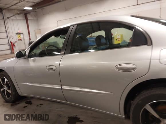 ✅ 2001 Oldsmobile Aurora • VIN: 1G3GS64C214111868 • Lot: 41721992. Listed on IAAI with 146,785 mi. Free auction sales archive from the USA and detailed vehicle history report at DreamBid. Image 15.