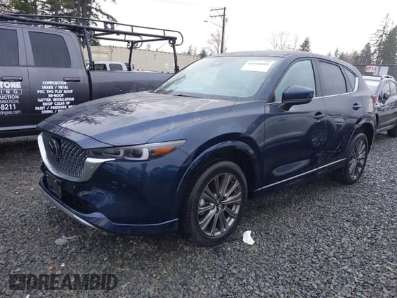 ✅ 2024 Mazda CX-5 Signature • VIN: JM3KFBXY6R0421448 • Lot: 41344699. Listed on IAAI with 18,738 mi. Free auction sales archive from the USA and detailed vehicle history report at DreamBid. Image 2.
