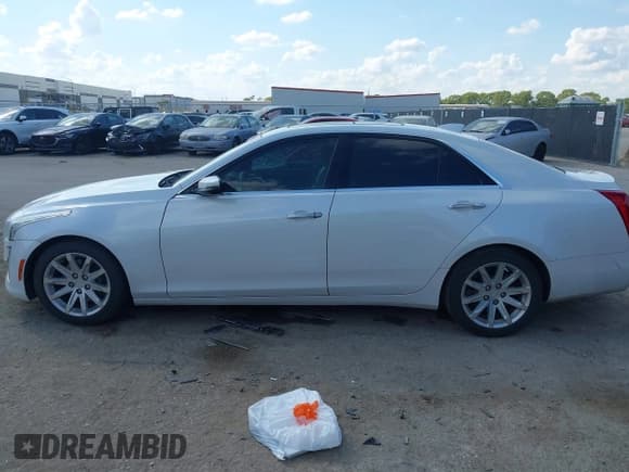 ✅ 2015 Cadillac CTS Luxury RWD • VIN: 1G6AR5SX8F0115314 • Лот: 43388516. Опубликован ранее на IAAI с пробегом 135 303 миль. Бесплатный доступ к архиву аукционных продаж из США и подробный отчёт об истории автомобиля на DreamBid. Изображение 14.