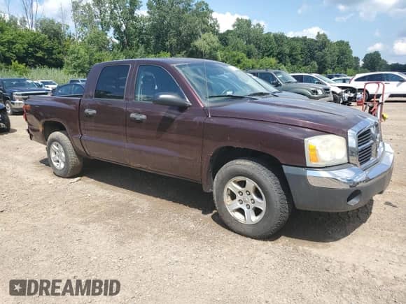 2005 Dodge Dakota SLT z VIN 1D7HW48K45S263060, wystawiony jako Copart lot #62115274 z przebiegiem 187 696 mil mil oraz Czysty tytuł • Clean title. Historia ofert i sprzedaży dostępna na DreamBid. Obrazek 4.
