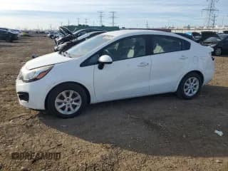 ✅ 2014 Kia Rio LX • VIN: KNADM4A39E6395299 • Lot: 92594225. Wystawiony na Copart z przebiegiem 106 842 mil. Bezpłatny archiwum sprzedaży aukcyjnych z USA i szczegółowy raport historii pojazdu na DreamBid. Zdjęcie 1.
