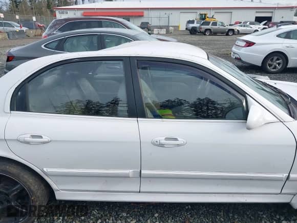 2004 Hyundai Sonata GLS with VIN KMHWF35H94A014600, listed as a IAAI auction lot 41031062 with 128,512 mi miles and . Bid and sale history available at DreamBid. Image 13.