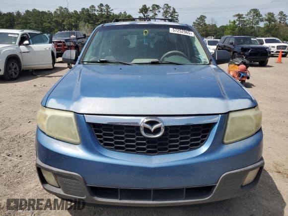 ✅ 2009 Mazda Tribute Sport • VIN: 4F2CZ02779KM01060 • Lot: 57252965. Wystawiony na Copart z przebiegiem 220 262 mil. Bezpłatny archiwum sprzedaży aukcyjnych z USA i szczegółowy raport historii pojazdu na DreamBid. Zdjęcie 5.