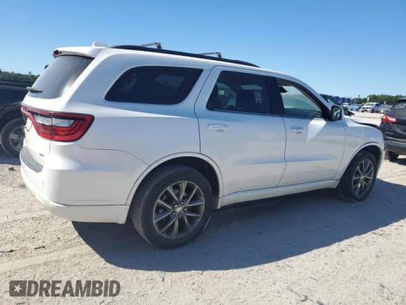 2018 Dodge Durango GT с VIN 1C4RDJDG2JC161619, выставлен на аукционе Copart как лот 86687465 с пробегом 148 892 миль миль и Списание • Salvage title. История ставок и продаж доступна на DreamBid. Изображение 3.