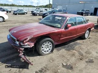 ✅ 2002 Jaguar XJ 8 • VIN: SAJDA14C02LF40401 • Лот: 80324655. Опубликован ранее на Copart с пробегом Не указан. Бесплатный доступ к архиву аукционных продаж из США и подробный отчёт об истории автомобиля на DreamBid. Изображение 1.