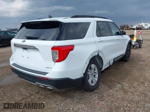 ✅ 2023 Ford Explorer XLT • VIN: 1FMSK8DH4PGB28563 • Lot: 43215905. Listed on IAAI with 48,987 mi. Free auction sales archive from the USA and detailed vehicle history report at DreamBid. Image 4.