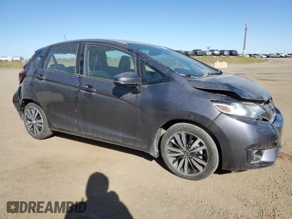 ✅ 2017 Honda Fit EX-L • VIN: 3HGGK5H82HM103057 • Лот: 86509645. Опубликован ранее на Copart с пробегом 101 528 миль. Бесплатный доступ к архиву аукционных продаж из США и подробный отчёт об истории автомобиля на DreamBid. Изображение 4.