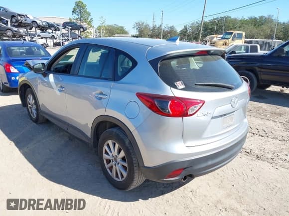 ✅ 2016 Mazda CX-5 Sport • VIN: JM3KE2BE9G0915168 • Lot: 41482749. Wystawiony na IAAI z przebiegiem 86 802 mil. Bezpłatny archiwum sprzedaży aukcyjnych z USA i szczegółowy raport historii pojazdu na DreamBid. Zdjęcie 3.