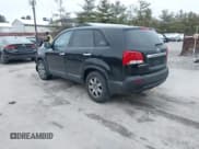 ✅ 2012 Kia Sorento LX • VIN: 5XYKTCA62CG244834 • Lot: 43853742. Listed on IAAI with 155,924 mi. Free auction sales archive from the USA and detailed vehicle history report at DreamBid. Image 3.