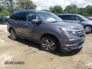 ✅ 2018 Honda Pilot Touring • VIN: 5FNYF6H99JB069585 • Lot: 64240475. Listed on Copart with 141,975 mi. Free auction sales archive from the USA and detailed vehicle history report at DreamBid. Image 4.