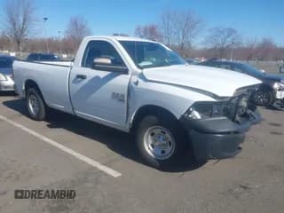 ✅ 2022 Ram 1500 Tradesman • VIN: 3C6JR6DG5NG441976 • Lot: 41690967. Listed on IAAI with 34,003 mi. Free auction sales archive from the USA and detailed vehicle history report at DreamBid. Image 1.
