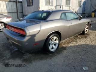 2011 Dodge Challenger z VIN 2B3CJ4DG9BH603294, wystawiony jako Copart lot #90291775 z przebiegiem 149 681 mil mil oraz Czysty tytuł • Clean title. Historia ofert i sprzedaży dostępna na DreamBid. Obrazek 3.