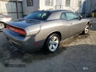 ✅ 2011 Dodge Challenger • VIN: 2B3CJ4DG9BH603294 • Lot: 90291775. Wystawiony na Copart z przebiegiem 149 681 mil. Bezpłatny archiwum sprzedaży aukcyjnych z USA i szczegółowy raport historii pojazdu na DreamBid. Zdjęcie 3.