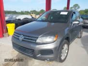 ✅ 2011 Volkswagen Touareg Sport • VIN: WVGFF9BP7BD000253 • Lot: 41512125. Listed on IAAI with 152,711 mi. Free auction sales archive from the USA and detailed vehicle history report at DreamBid. Image 2.