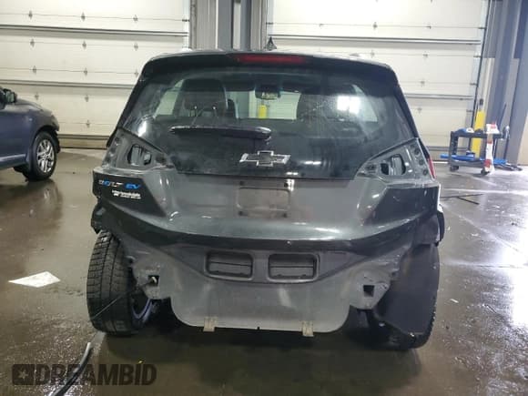 ✅ 2018 Chevrolet Bolt EV Premier • VIN: 1G1FX6S04J4108808 • Lot: 82117425. Listed on Copart with 54,651 mi. Free auction sales archive from the USA and detailed vehicle history report at DreamBid. Image 6.