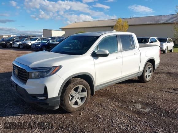 ✅ 2022 Honda Ridgeline RTL • VIN: 5FPYK3F50NB025921 • Lot: 43483259. Listed on IAAI with 45,266 mi. Free auction sales archive from the USA and detailed vehicle history report at DreamBid. Image 2.