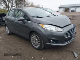 ✅ 2016 Ford Fiesta Titanium • VIN: 3FADP4FJXGM130417 • Lot: 40877846. Wystawiony na IAAI z przebiegiem 99 766 mil. Bezpłatny archiwum sprzedaży aukcyjnych z USA i szczegółowy raport historii pojazdu na DreamBid. Zdjęcie 1.