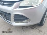 ✅ 2014 Ford Escape SE • VIN: 1FMCU0GX1EUB00673 • Lot: 41484757. Listed on IAAI with 147,409 mi. Free auction sales archive from the USA and detailed vehicle history report at DreamBid. Image 12.