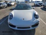 ✅ 2015 Porsche 911 4S • VIN: WP0BB2A97FS135579 • Lot: 45691305. Wystawiony na Copart z przebiegiem 10 678 mil. Bezpłatny archiwum sprzedaży aukcyjnych z USA i szczegółowy raport historii pojazdu na DreamBid. Zdjęcie 5.