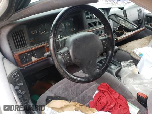 ✅ 1996 Jeep Grand Cherokee Laredo • VIN: 1J4GZ58S2TC401845 • Лот: 61013044. Опубликован ранее на Copart с пробегом Не указан. Бесплатный доступ к архиву аукционных продаж из США и подробный отчёт об истории автомобиля на DreamBid. Изображение 8.
