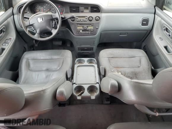 ✅ 2002 Honda Odyssey EX-L • VIN: 2HKRL18032H560593 • Lot: 80143975. Listed on Copart with 128,198 mi. Free auction sales archive from the USA and detailed vehicle history report at DreamBid. Image 8.