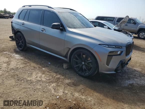 ✅ 2024 BMW X7 M60i • VIN: 5UX33EM07R9S74394 • Лот: 70671025. Опубликован ранее на Copart с пробегом 20 799 миль. Бесплатный доступ к архиву аукционных продаж из США и подробный отчёт об истории автомобиля на DreamBid. Изображение 4.