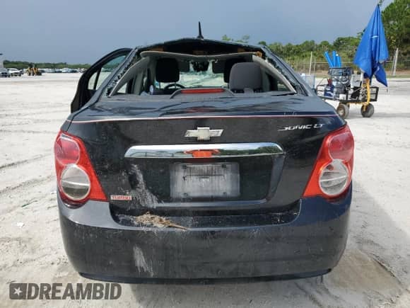 2012 Chevrolet Sonic LT z VIN 1G1JC5SB0C4187463, wystawiony jako Copart lot #68758074 z przebiegiem 123 060 mil mil oraz Szkoda całkowita • Salvage title. Historia ofert i sprzedaży dostępna na DreamBid. Obrazek 6.