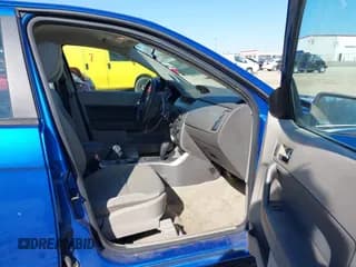 ✅ 2011 Ford Focus SES • VIN: 1FAHP3GN9BW200107 • Lot: 43676080. Wystawiony na IAAI z przebiegiem 236 181 mil. Bezpłatny archiwum sprzedaży aukcyjnych z USA i szczegółowy raport historii pojazdu na DreamBid. Zdjęcie 5.