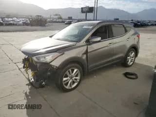 2016 Hyundai Santa Fe z VIN 5XYZWDLA1GG342823, wystawiony jako Copart lot #67269025 z przebiegiem Nie podano mil oraz Szkoda całkowita • Salvage title. Historia ofert i sprzedaży dostępna na DreamBid. Obrazek 1.
