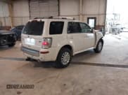 ✅ 2010 Mercury Mariner Premier • VIN: 4M2CN8HGXAKJ00279 • Lot: 41748487. Listed on IAAI with 116,565 mi. Free auction sales archive from the USA and detailed vehicle history report at DreamBid. Image 4.