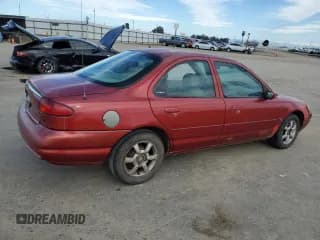 ✅ 1999 Ford Contour SE • VIN: 1FAFP6633XK158685 • Лот: 46701805. Опубликован ранее на Copart с пробегом 407 846 миль. Бесплатный доступ к архиву аукционных продаж из США и подробный отчёт об истории автомобиля на DreamBid. Изображение 3.