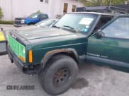 ✅ 2000 Jeep Cherokee • VIN: 1J4FF48S4YL260945 • Lot: 43225984. Listed on IAAI with 212,606 mi. Free auction sales archive from the USA and detailed vehicle history report at DreamBid. Image 12.