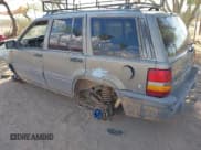 ✅ 1995 Jeep Grand Cherokee Laredo • VIN: 1J4GZ58S9SC569349 • Lot: 43305892. Listed on IAAI with 209,279 mi. Free auction sales archive from the USA and detailed vehicle history report at DreamBid. Image 3.