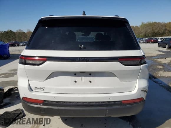 ✅ 2023 Jeep Grand Cherokee Altitude • VIN: 1C4RJGAG3PC571130 • Lot: 49879155. Listed on Copart with 24,563 mi. Free auction sales archive from the USA and detailed vehicle history report at DreamBid. Image 6.