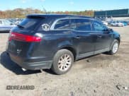✅ 2019 Lincoln MKT • VIN: 2LMHJ5NK1KBL00980 • Lot: 43603678. Listed on IAAI with 137,125 mi. Free auction sales archive from the USA and detailed vehicle history report at DreamBid. Image 4.