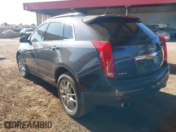 ✅ 2013 Cadillac SRX Performance Collection • VIN: 3GYFNDE37DS541190 • Lot: 43824732. Listed on IAAI with 82,804 mi. Free auction sales archive from the USA and detailed vehicle history report at DreamBid. Image 3.