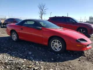 1994 Chevrolet Camaro z VIN 2G1FP22SXR2165249, wystawiony jako Copart lot #49333055 z przebiegiem 196 736 mil mil oraz Czysty tytuł • Clean title. Historia ofert i sprzedaży dostępna na DreamBid. Obrazek 4.