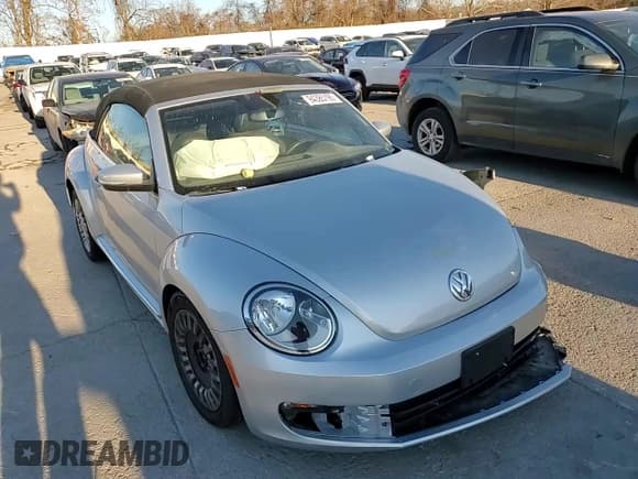 ✅ 2014 Volkswagen Beetle 1.8T • VIN: 3VW517AT4EM813931 • Lot: 94385195. Listed on Copart with Not provided. Free auction sales archive from the USA and detailed vehicle history report at DreamBid. Image 13.