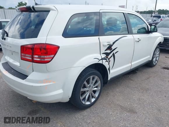 ✅ 2014 Dodge Journey SE • VIN: 3C4PDCAB8ET148539 • Lot: 42674214. Listed on IAAI with 172,272 mi. Free auction sales archive from the USA and detailed vehicle history report at DreamBid. Image 4.