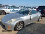 ✅ 2003 Nissan 350Z Touring • VIN: JN1AZ34D43T103694 • Lot: 42602625. Wystawiony na IAAI z przebiegiem 271 699 mil. Bezpłatny archiwum sprzedaży aukcyjnych z USA i szczegółowy raport historii pojazdu na DreamBid. Zdjęcie 2.