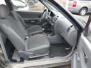 2000 Hyundai Accent z VIN KMHCF35G7YU015260, wystawiony jako IAAI lot #42322886 z przebiegiem 273 445 mil mil oraz . Historia ofert i sprzedaży dostępna na DreamBid. Obrazek 5.